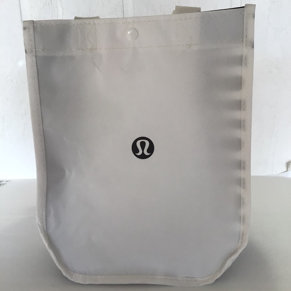 LULULEMON SMALL BLACK AND WHITE REUSABLE TOTE BAG.